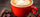 Feuerrote Tasse mit Chilicappuccino – Rezept für würzigen Chilikaffee.